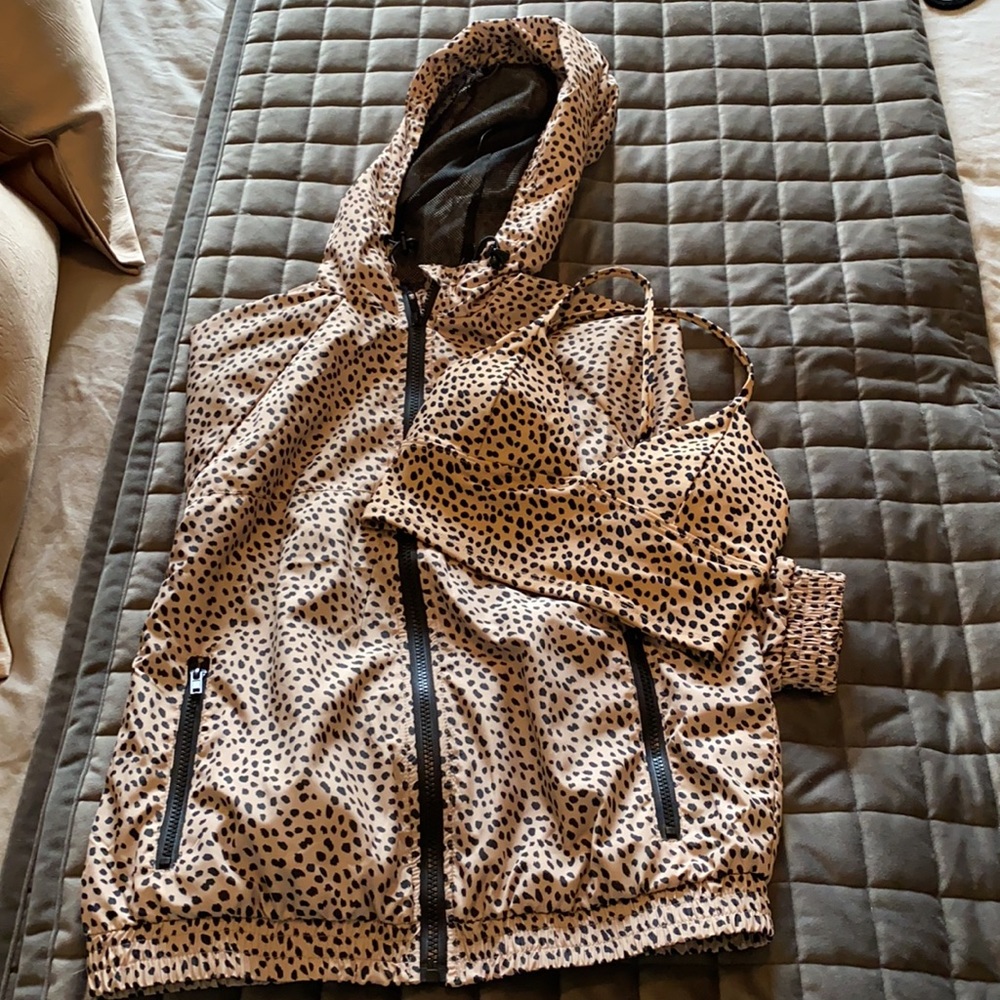 Animal print light weight windbreaker jacket.